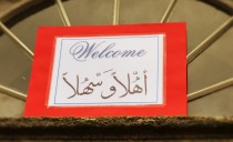 Language of love creates family at party for Syrian refugees